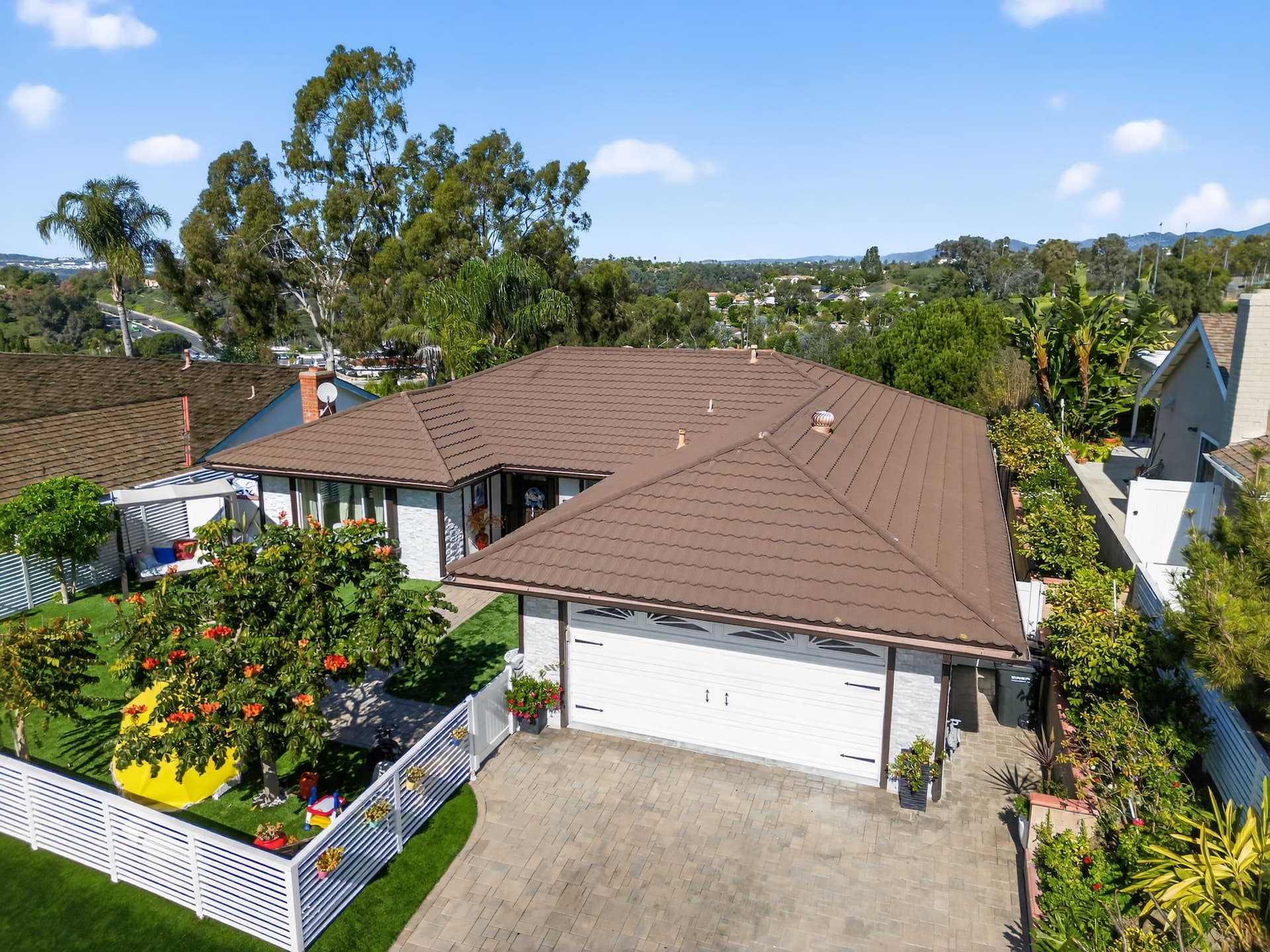 Aerial real estate photo — charming home with mountain views