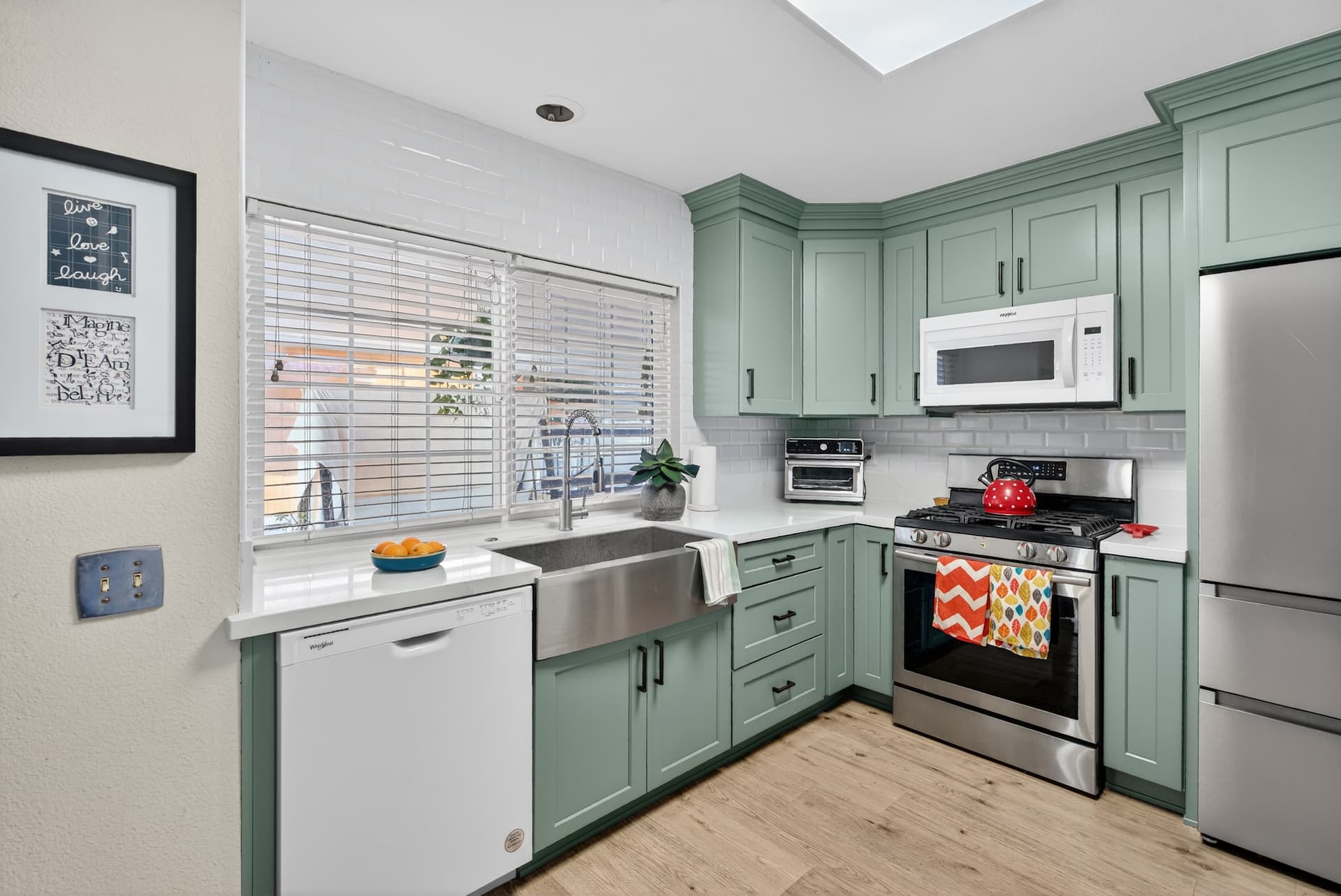 Sage green kitchen stainless appliances — Orange County