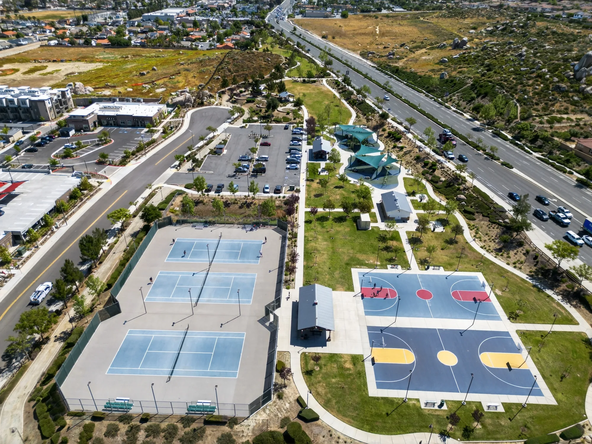 Aerial drone photo of community tennis and basketball courts