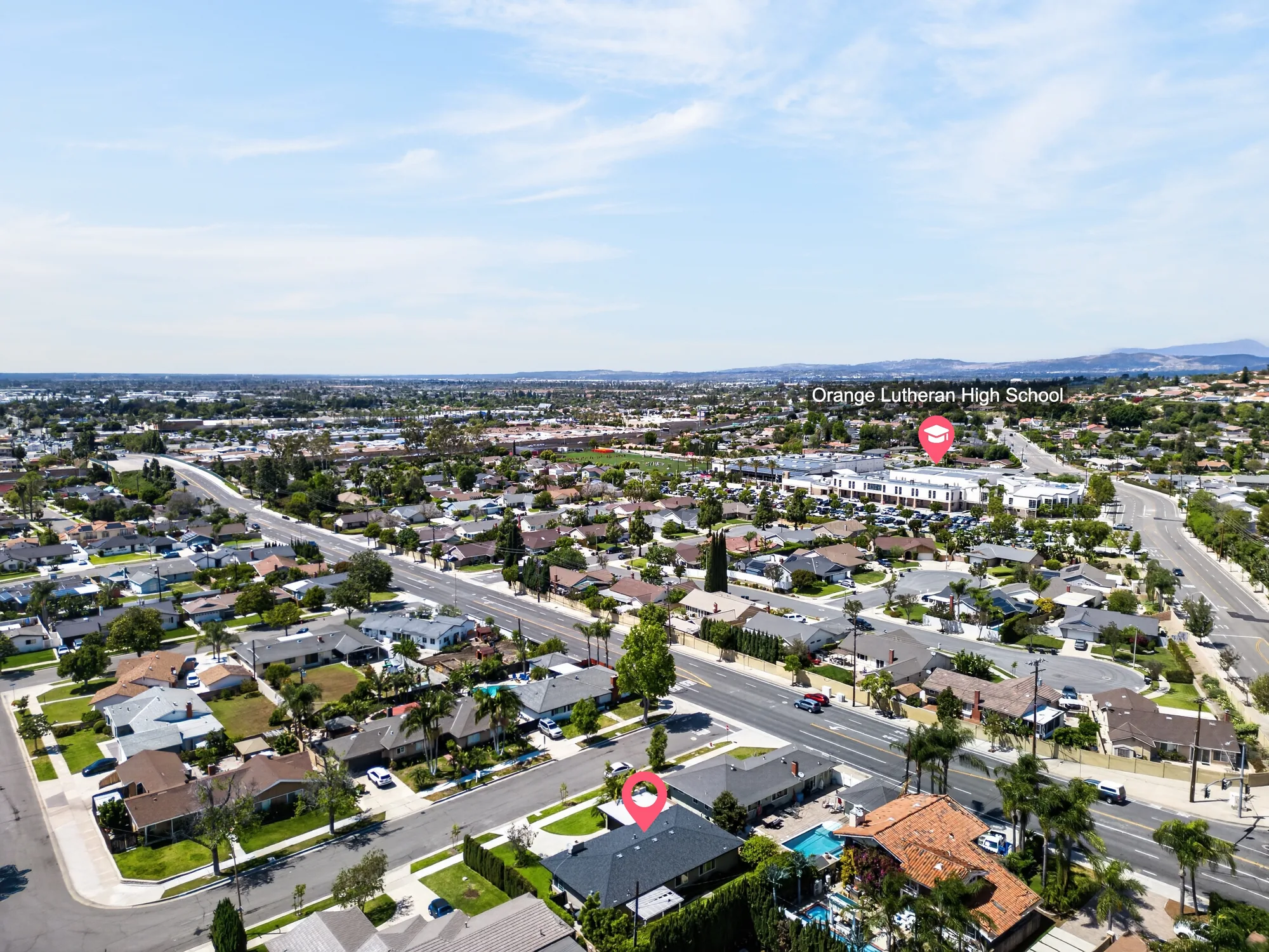 Aerial drone photo with home and Orange Lutheran High School pin markers