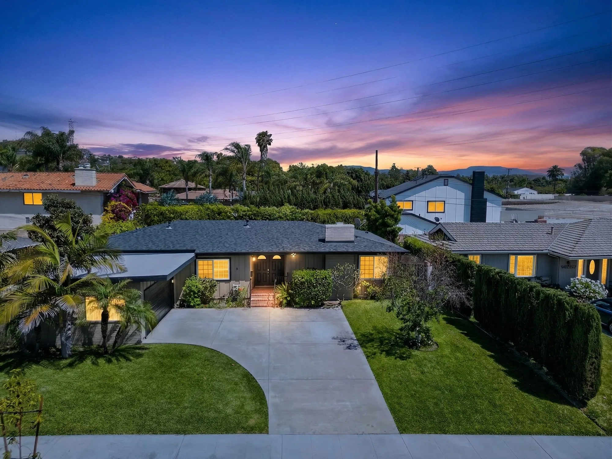 Twilight aerial drone photo of ranch-style home Orange County