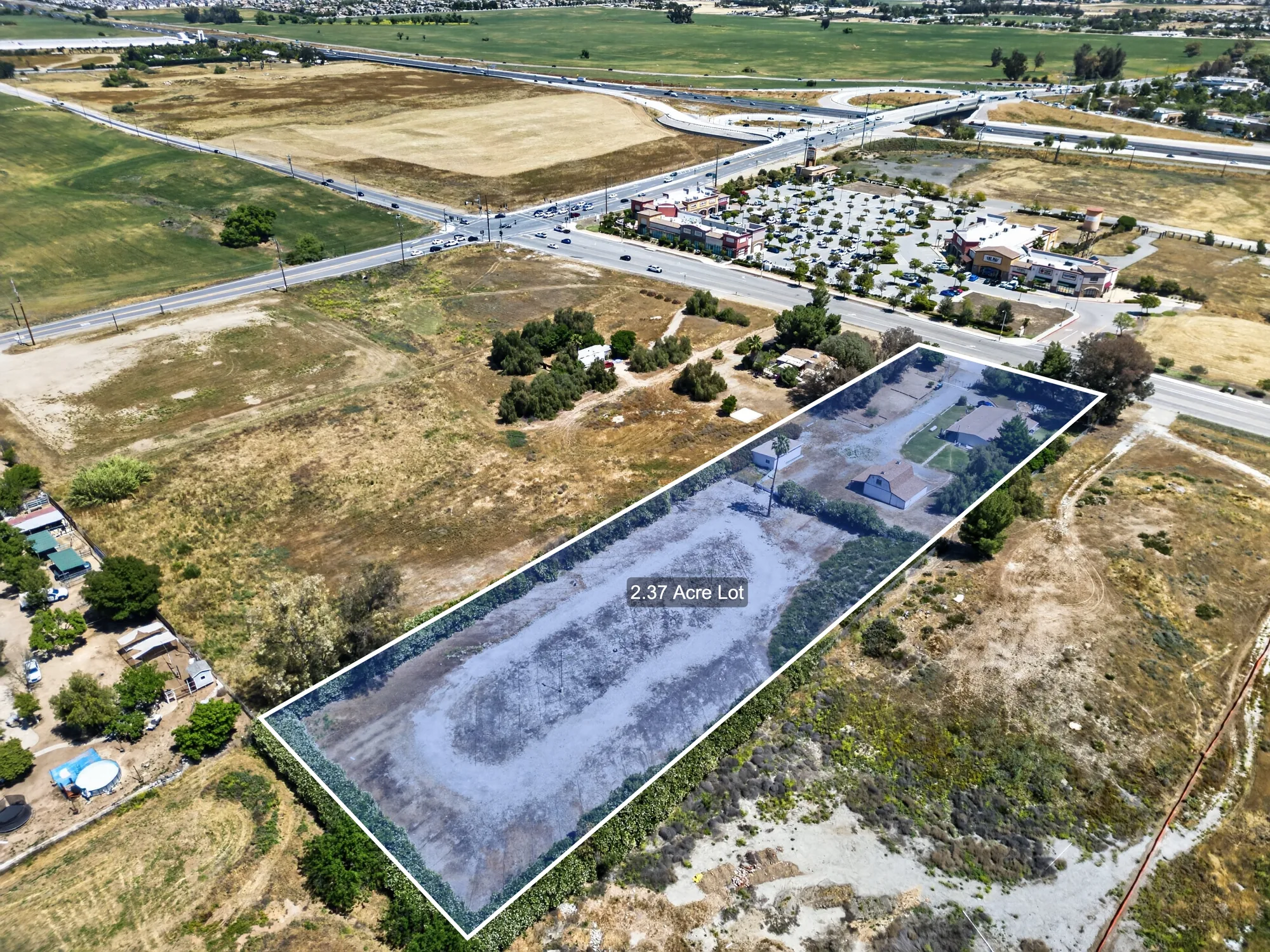 Aerial drone photo with 2.37 acre lot boundary outline overlay Inland Empire