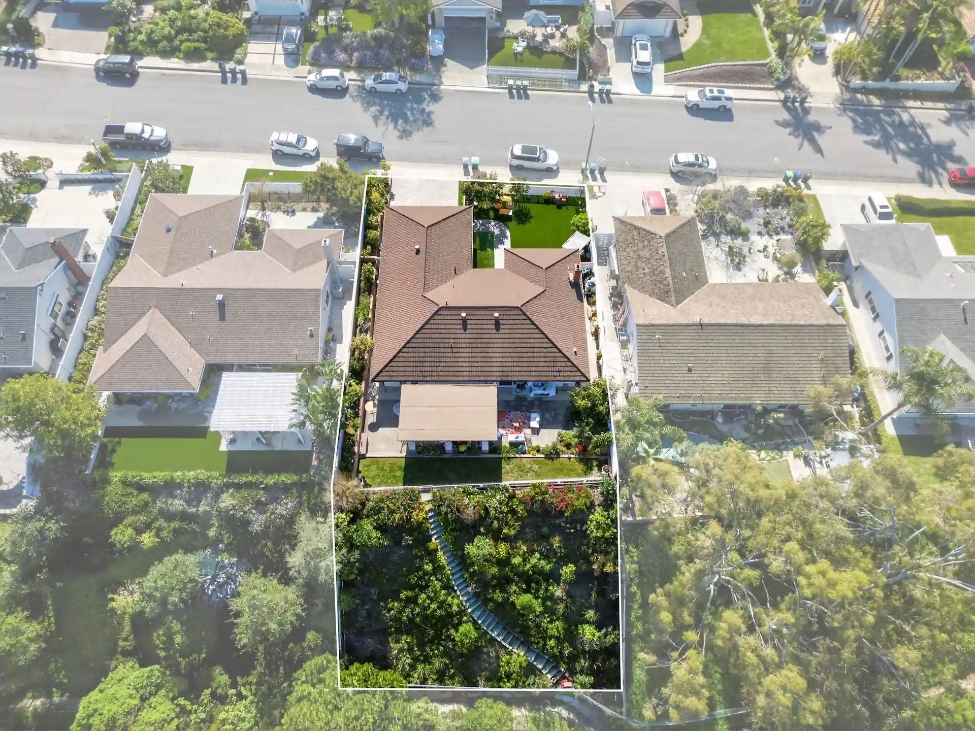 Overhead aerial drone photo with property line overlay showing deep rear lot
